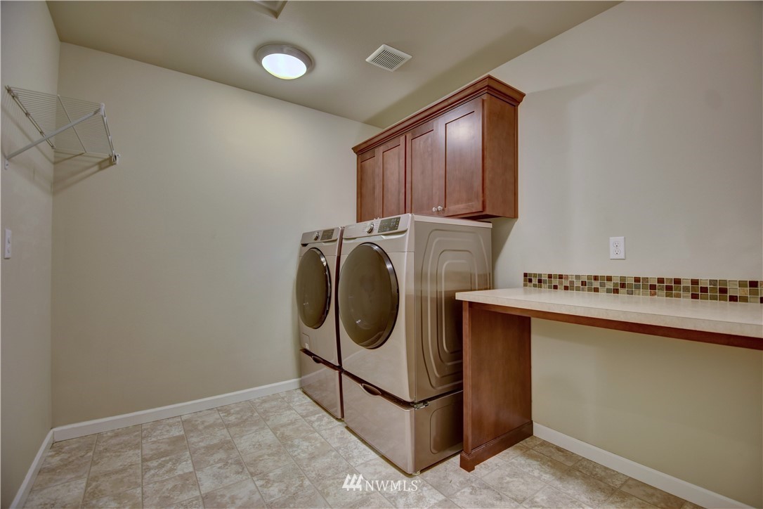 4835 Rosa Court Lacey, WA 98503 - Photo 20 of 40 a utility room with dryer and washer