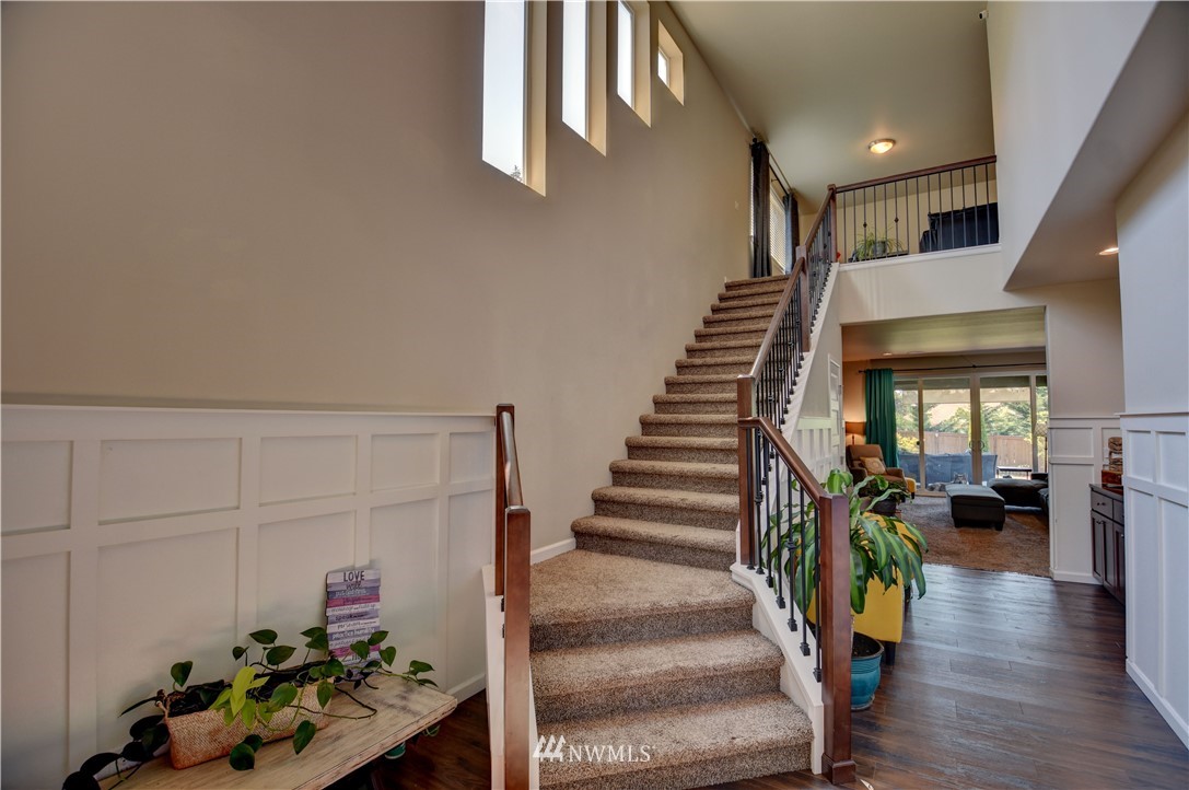 4835 Rosa Court Lacey, WA 98503 - Photo 3 of 40 a view of entryway with stairs and wooden floor