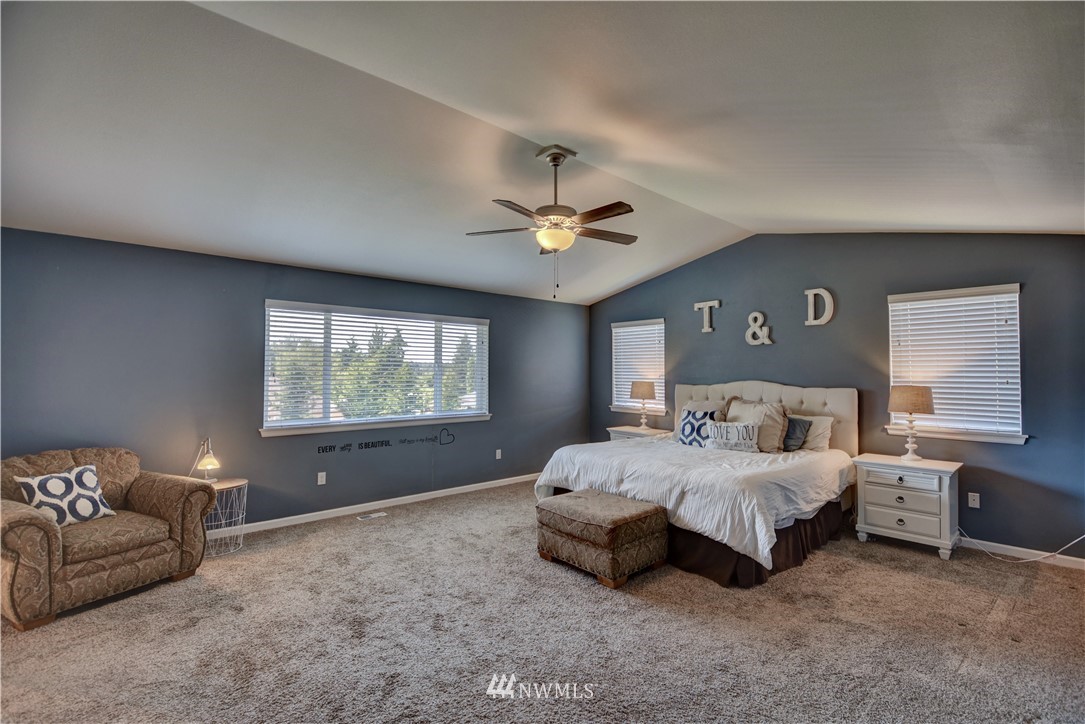 4835 Rosa Court Lacey, WA 98503 - Photo 27 of 40 a bedroom with bed and window