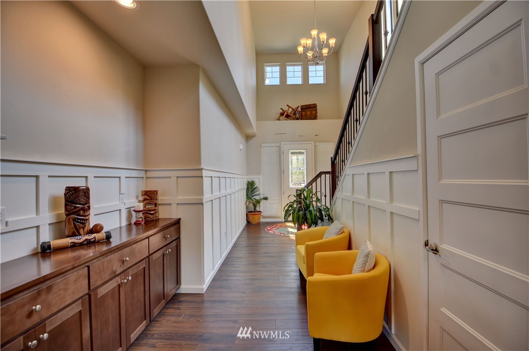 4835 Rosa Court Lacey, WA 98503 - Photo 4 of 40 a view of entryway and hall with wooden floor