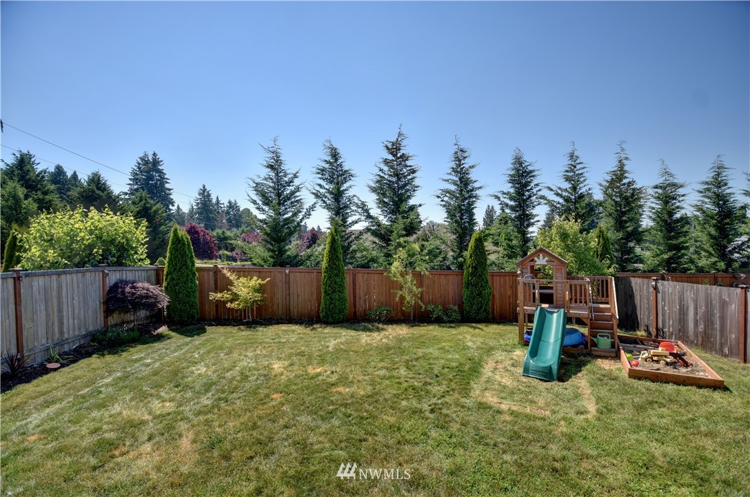 4835 Rosa Court Lacey, WA 98503 - Photo 35 of 40 a view of a backyard with furniture