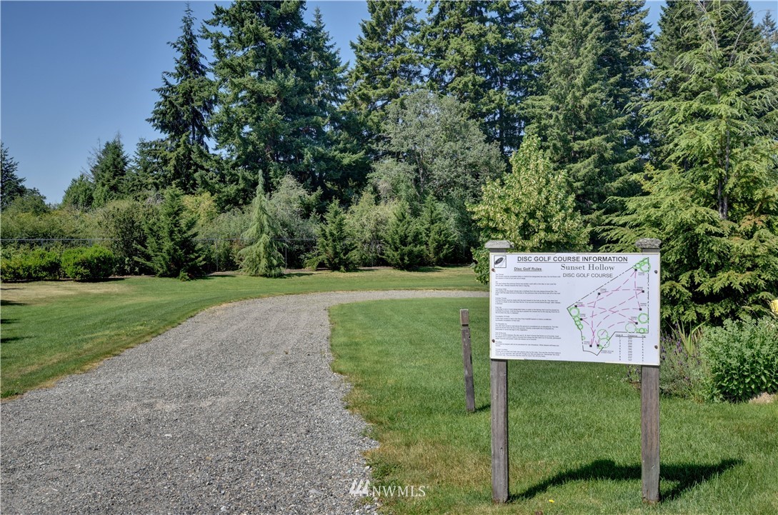 4835 Rosa Court Lacey, WA 98503 - Photo 39 of 40 a view of a field with a tree