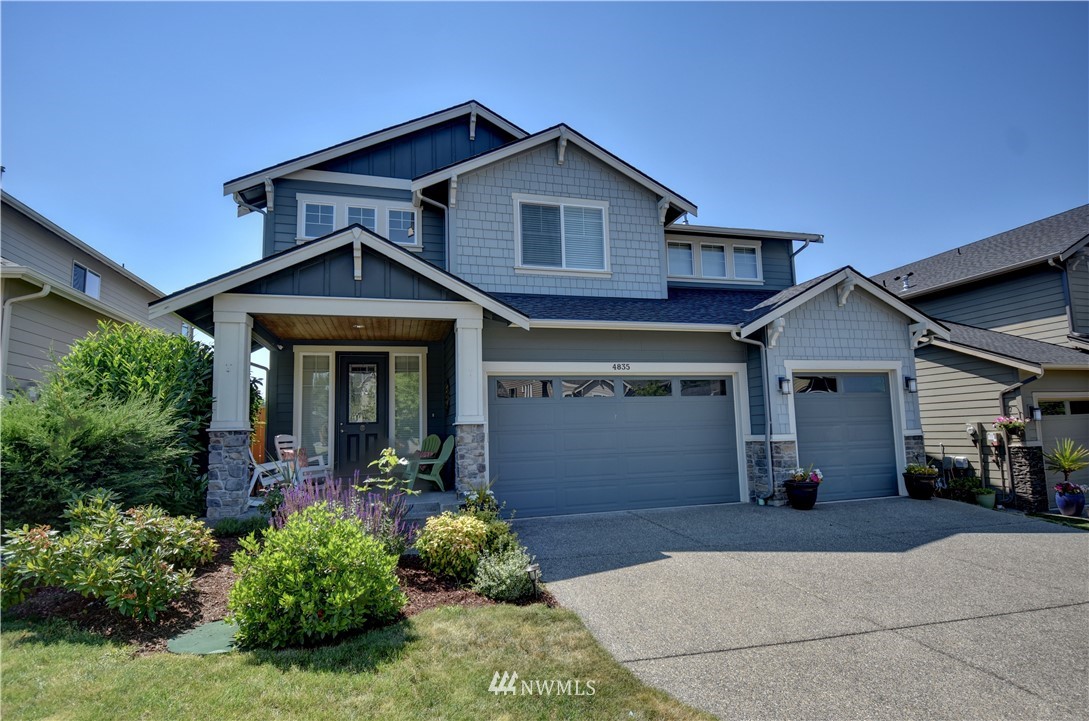 4835 Rosa Court Lacey, WA 98503 - Photo 40 of 40 a front view of a house with garden