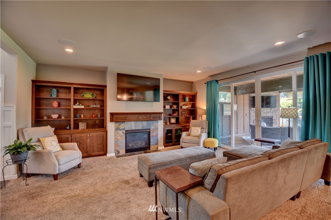4835 Rosa Court Lacey, WA 98503 - Photo 7 of 40 a living room with furniture and a fireplace