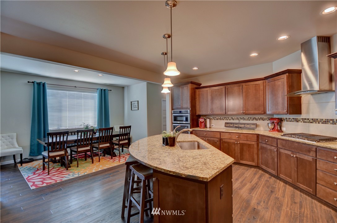 4835 Rosa Court Lacey, WA 98503 - Photo 8 of 40 a kitchen with counter space sink appliances and cabinets