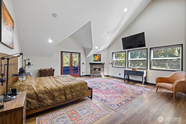 a living room with furniture window and fireplace