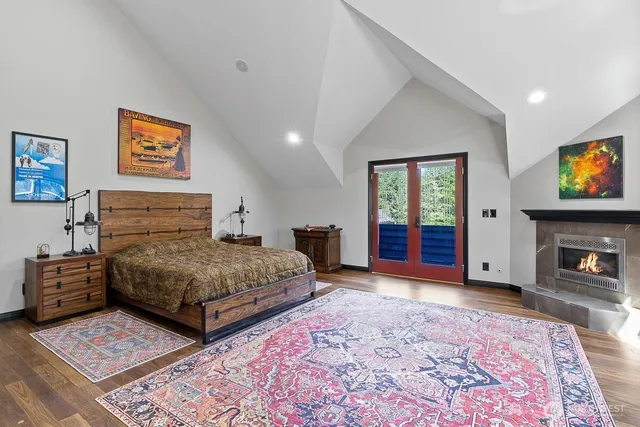 a spacious bathroom with a granite countertop sink and a large mirror
