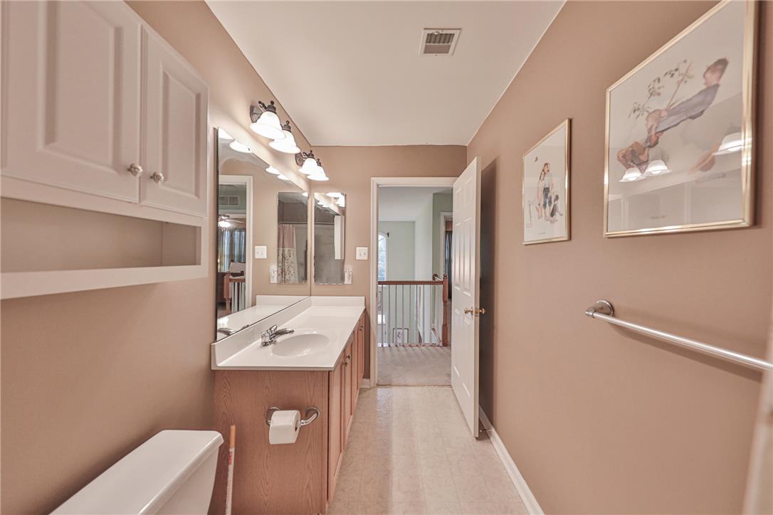 138 Clover Hollow Road Easton, PA 18045 - Photo 52 of 95 A streamlined primary bathroom with a spacious vanity, dual mirrors, and overhead lighting.