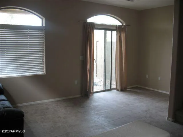 an empty room that has a window
