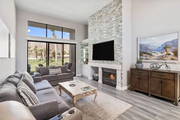 a kitchen with a sink and a refrigerator