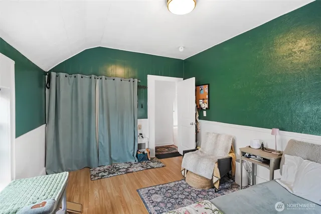 a living room with furniture and a yard