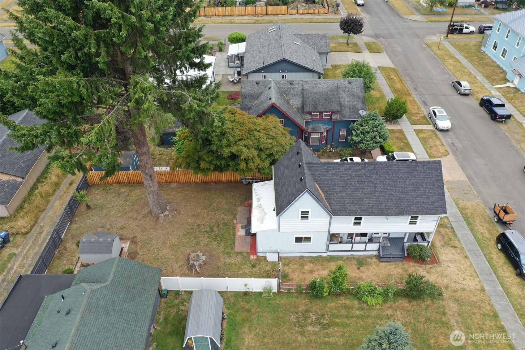 1224 4th Street Cosmopolis, WA 98537 - Photo 22 of 25 an aerial view of residential houses with outdoor space and swimming pool