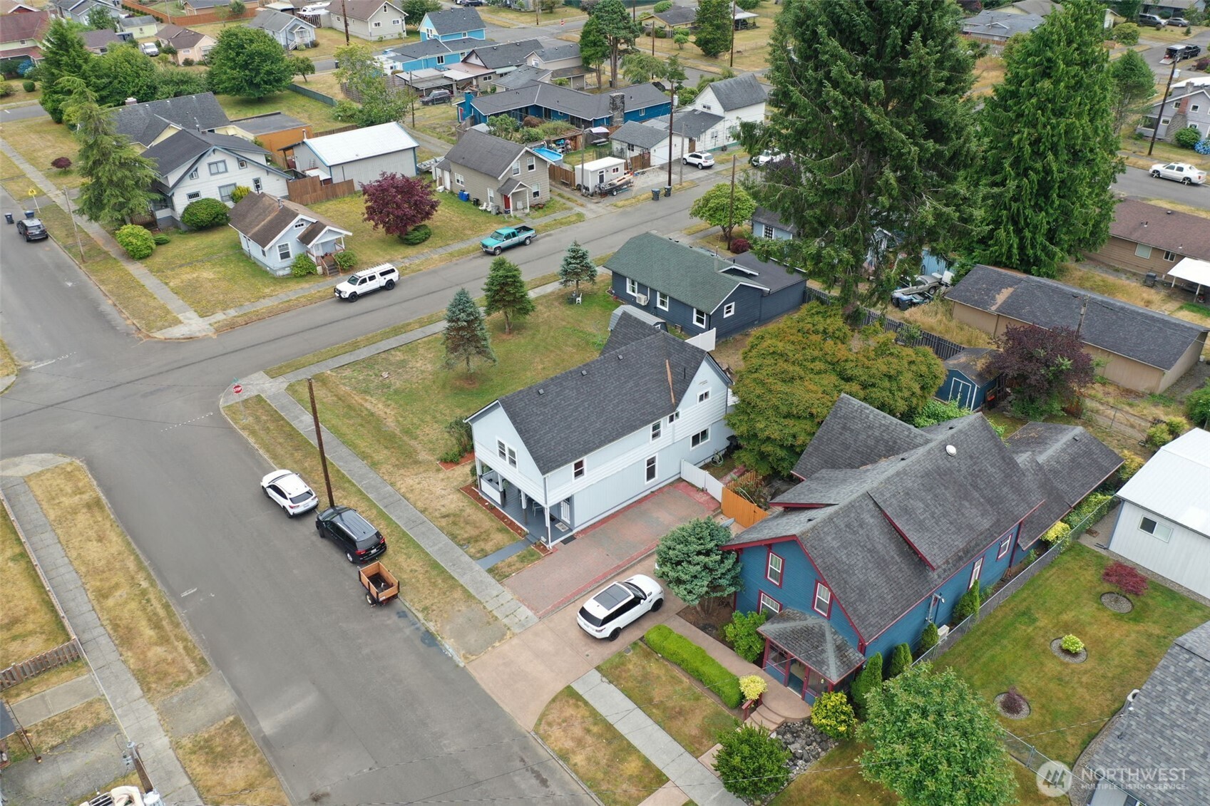 1224 4th Street Cosmopolis, WA 98537 - Photo 23 of 25 an aerial view of residential house with parking