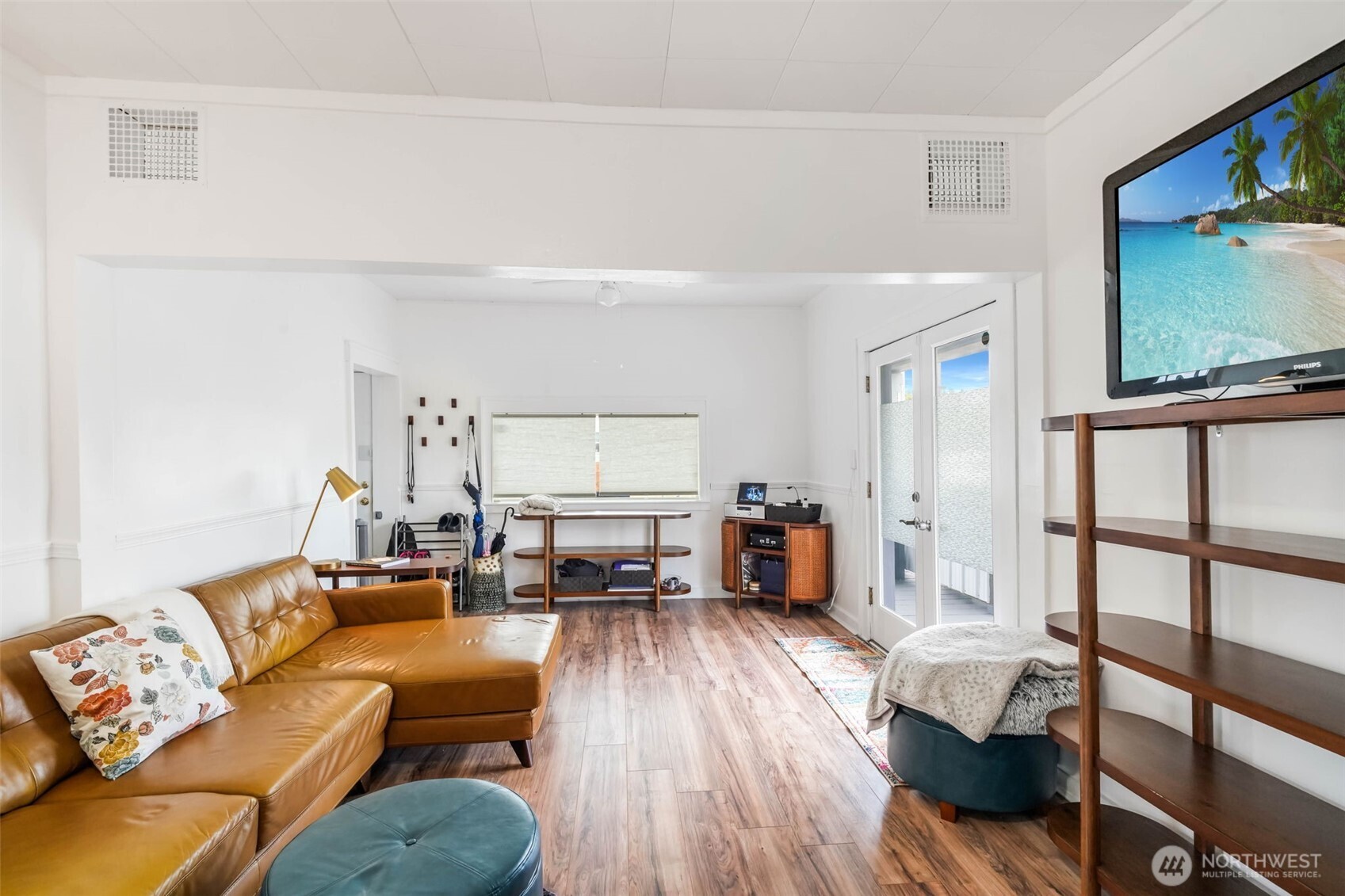 1224 4th Street Cosmopolis, WA 98537 - Photo 5 of 25 a living room with furniture and a flat screen tv