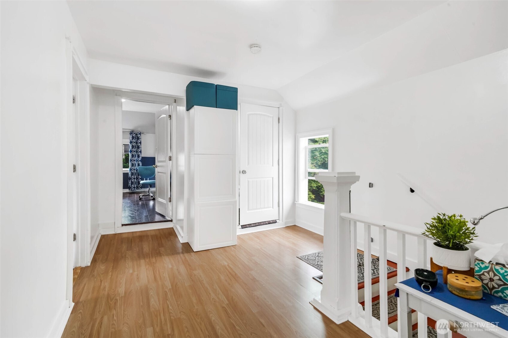 1224 4th Street Cosmopolis, WA 98537 - Photo 10 of 25 a view of an entryway with wooden floor and front door