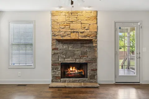 a living room with a fireplace