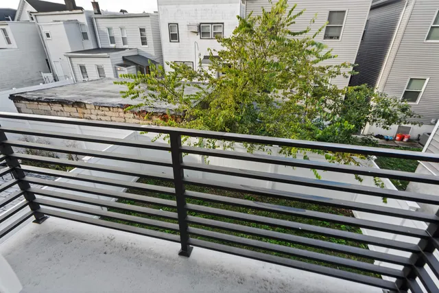 a view of a building from a balcony