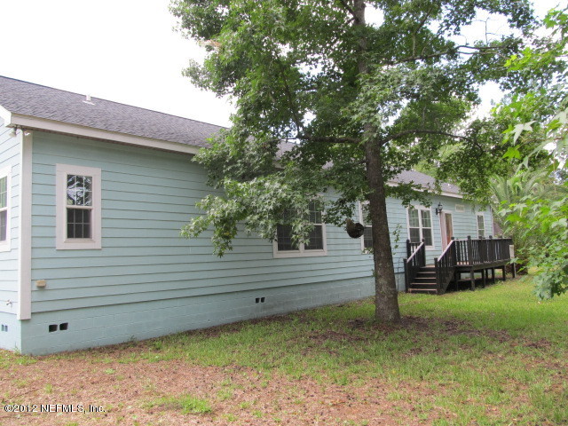 1690 Borrow Pit Road St. Johns, FL 32259 - Photo 1 of 19 Front