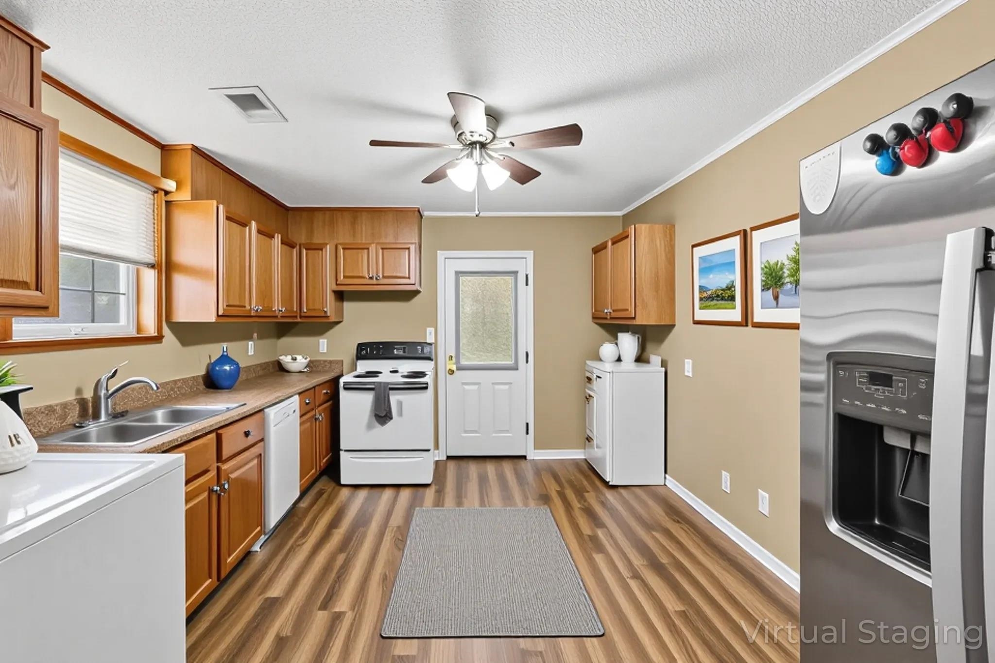 4140 Pleasant Ridge Road Millington, TN 38053 - Photo 13 of 30 Kitchen featuring white appliances, dark wood-style floors, a ceiling fan, washer / clothes dryer, and crown molding