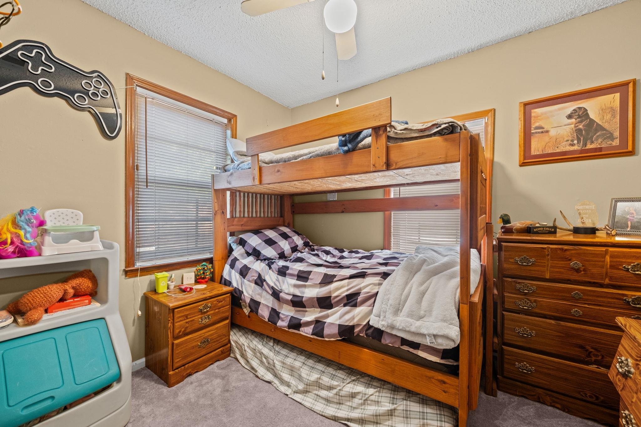 4140 Pleasant Ridge Road Millington, TN 38053 - Photo 20 of 30 Bedroom featuring carpet flooring, a textured ceiling, and ceiling fan