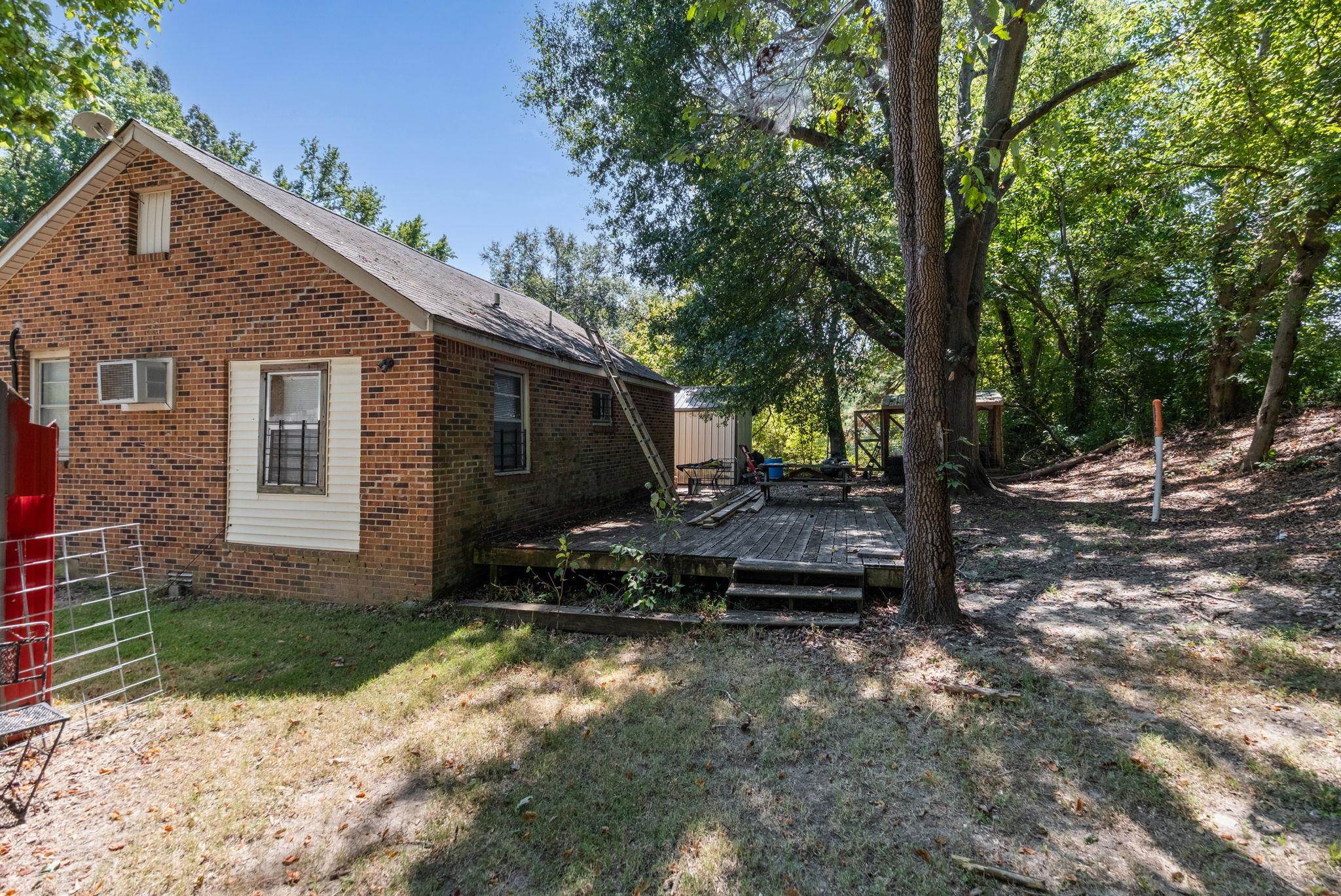 4140 Pleasant Ridge Road Millington, TN 38053 - Photo 27 of 30 View of yard featuring a wooden deck