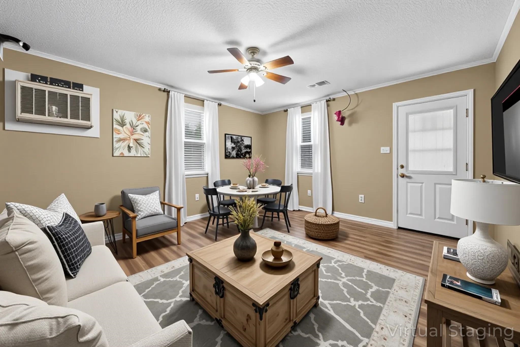 4140 Pleasant Ridge Road Millington, TN 38053 - Photo 5 of 30 Living area featuring crown molding, wood finished floors, a textured ceiling, plenty of natural light, and ceiling fan