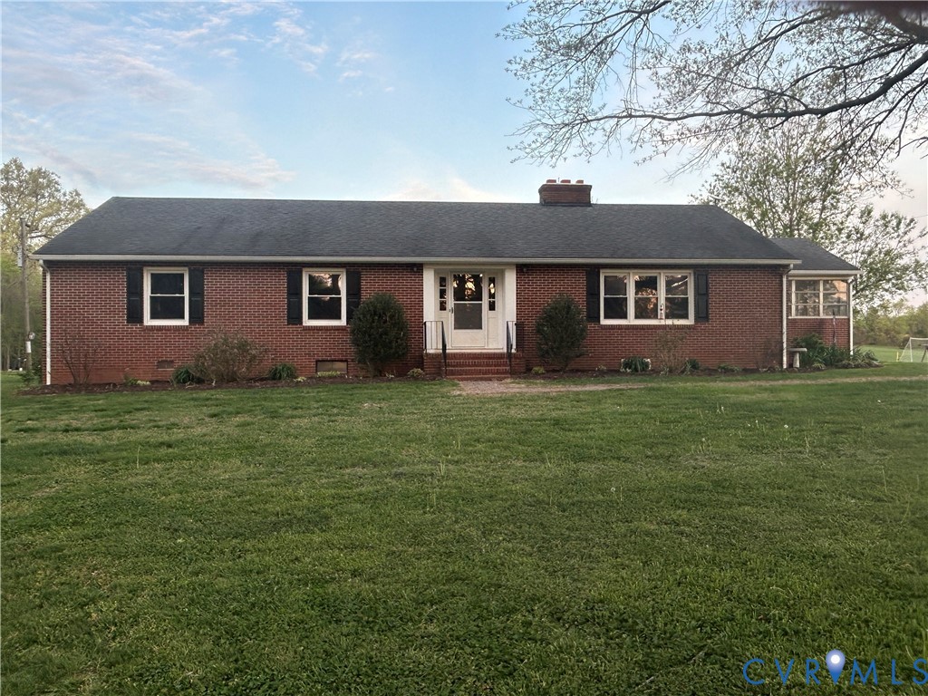 front view of house with a yard