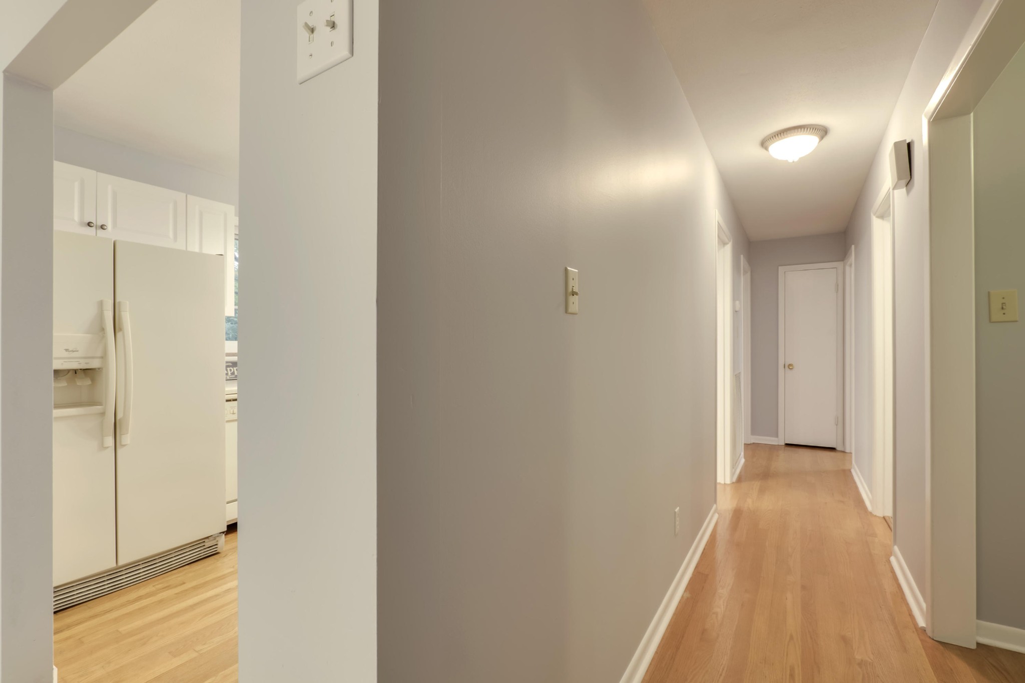 7604 Ogg Road Knoxville, TN 37938 - Photo 28 of 39 a view of hallway with wooden floor