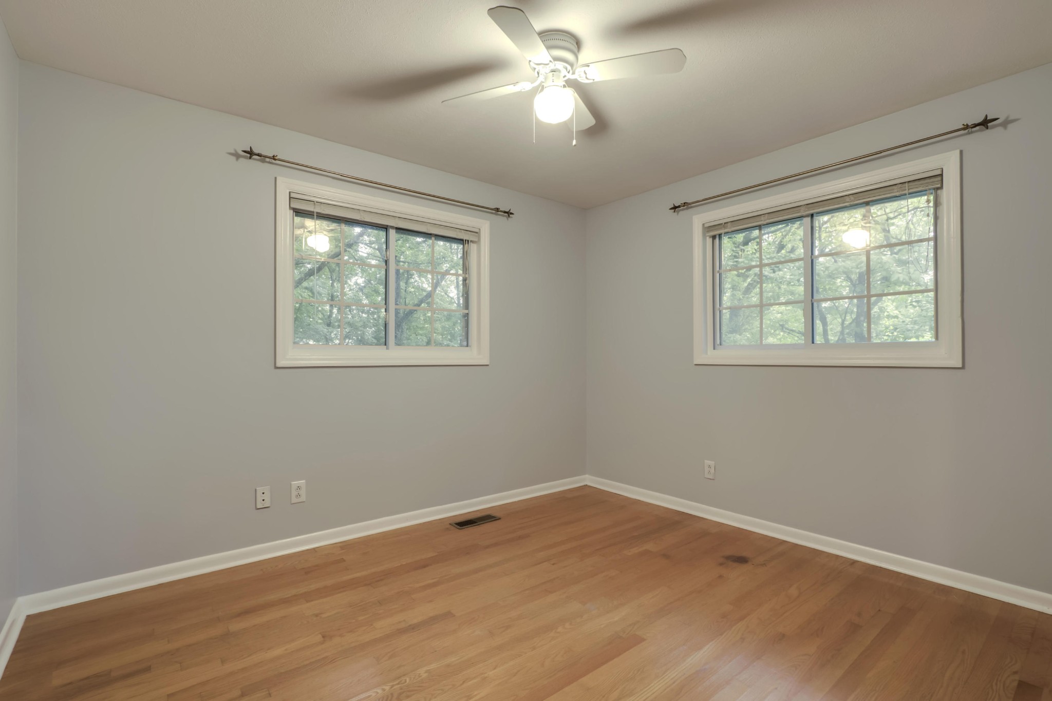 7604 Ogg Road Knoxville, TN 37938 - Photo 31 of 39 a view of empty room with wooden floor and fan