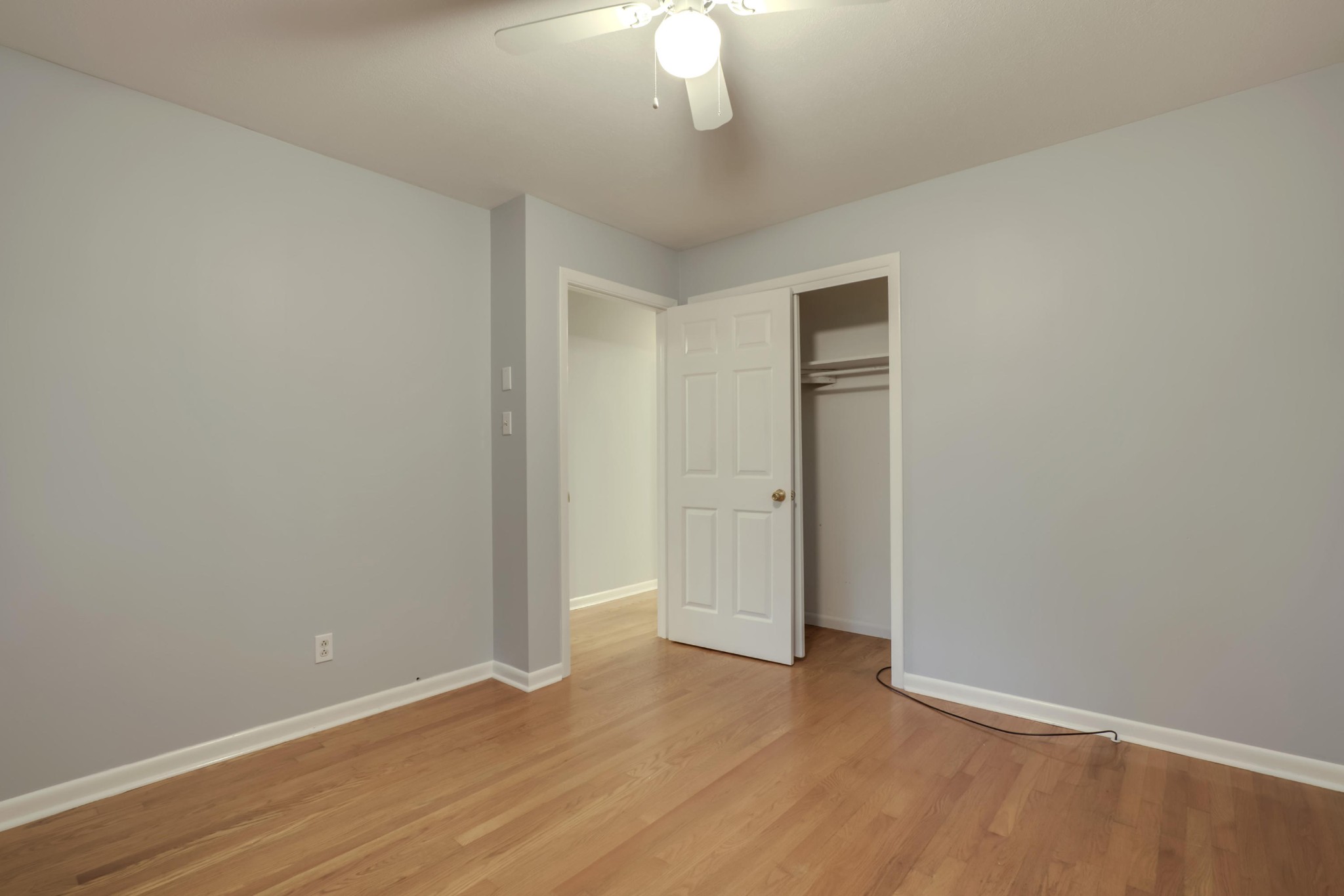7604 Ogg Road Knoxville, TN 37938 - Photo 32 of 39 a view of an empty room with wooden floor and a window