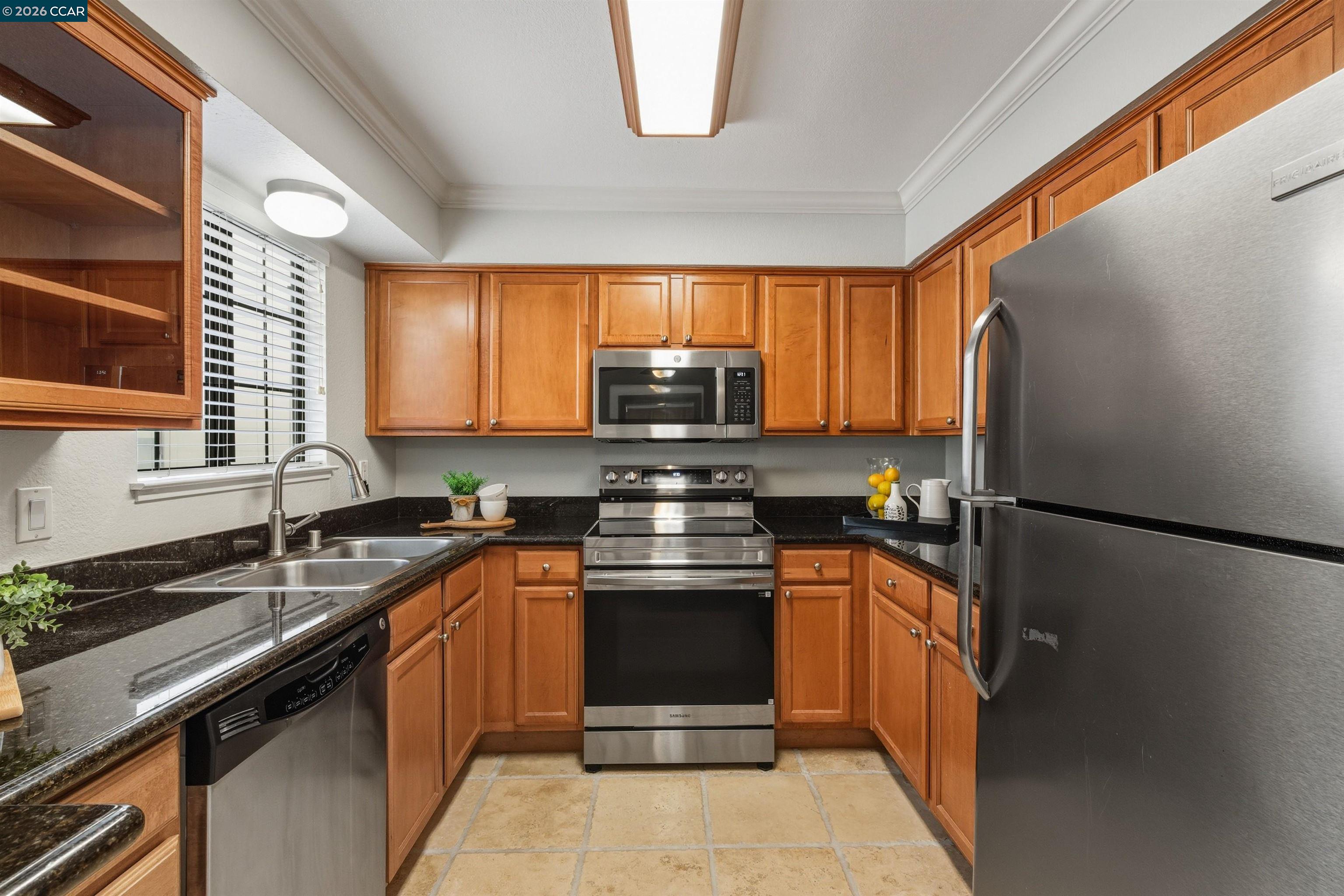 332 Eastridge Drive San Ramon, CA 94582 - Photo 16 of 41 a kitchen with stainless steel appliances granite countertop a refrigerator and a sink