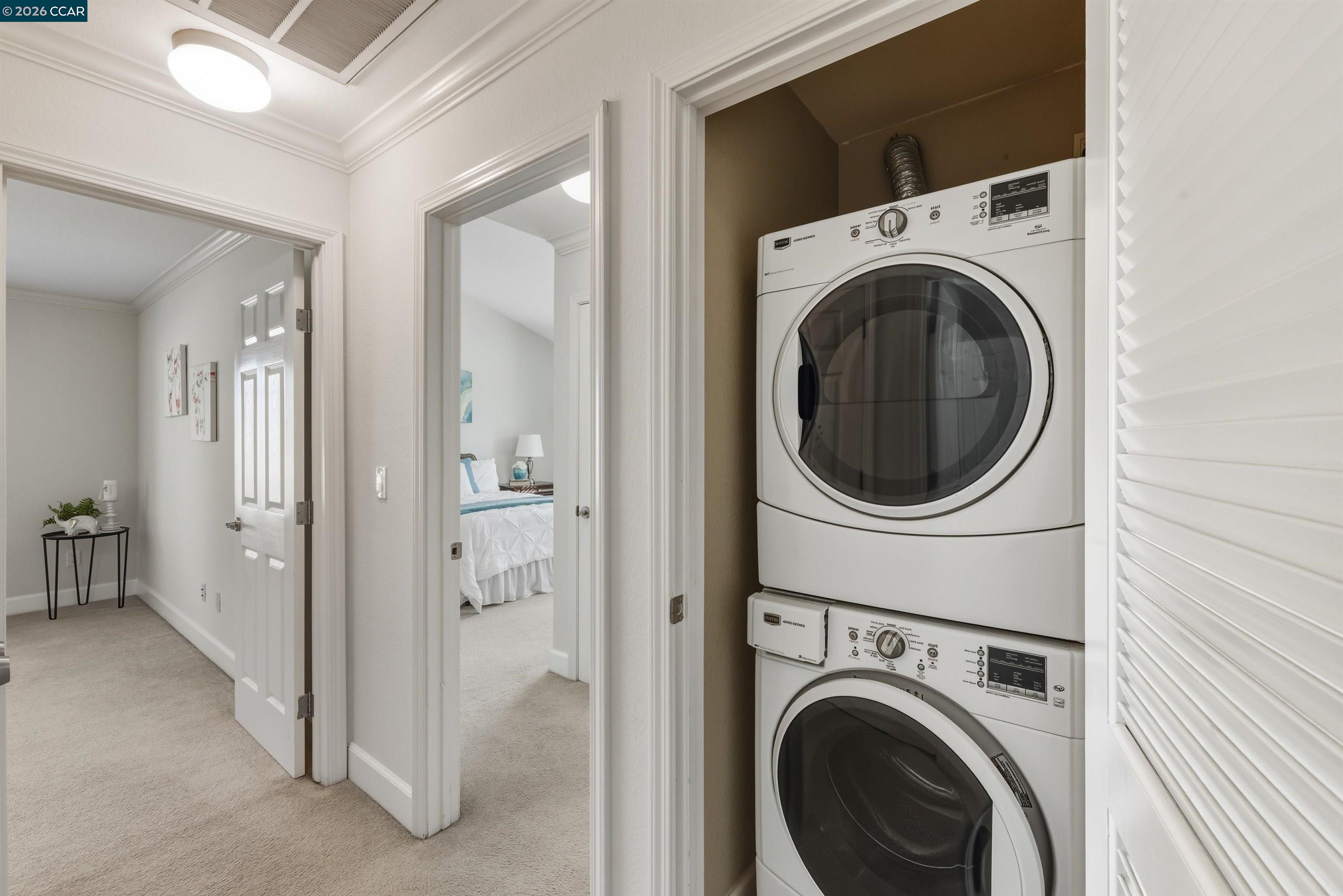 332 Eastridge Drive San Ramon, CA 94582 - Photo 31 of 41 a view of a hallway with washer and dryer