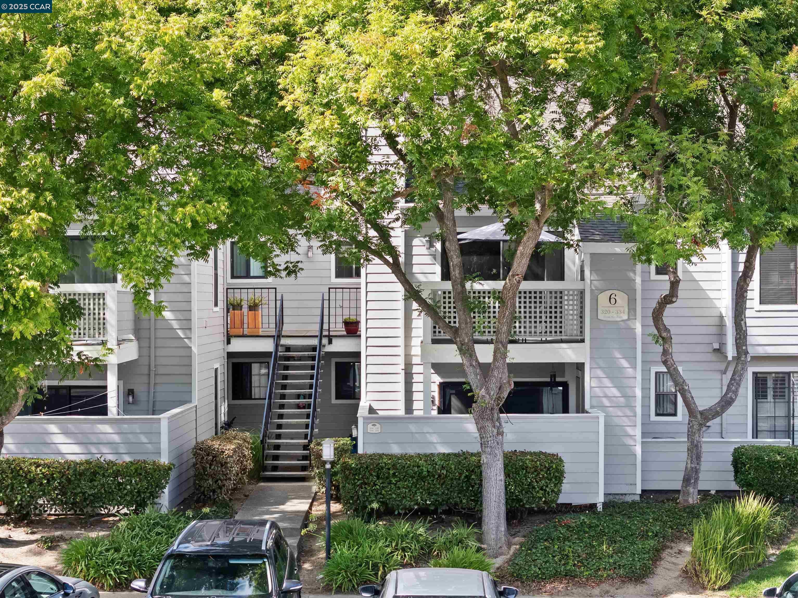 332 Eastridge Drive San Ramon, CA 94582 - Photo 5 of 41 a front view of a house with glass windows and plants