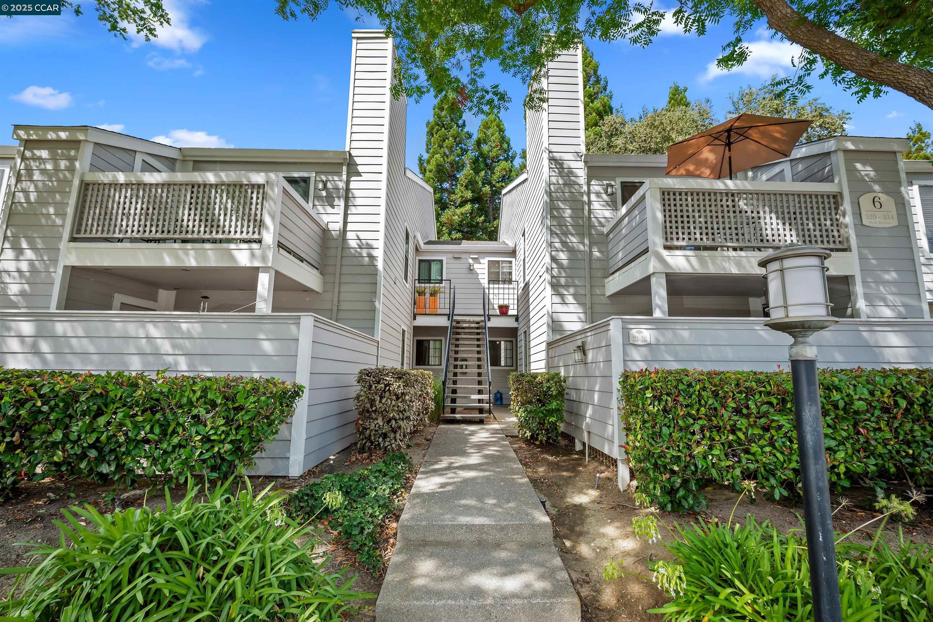 332 Eastridge Drive San Ramon, CA 94582 - Photo 6 of 41 a front view of a house with a yard