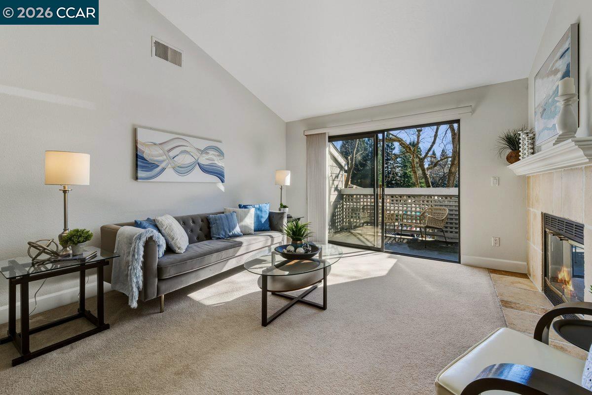 332 Eastridge Drive San Ramon, CA 94582 - Photo 10 of 41 a living room with furniture and a fireplace