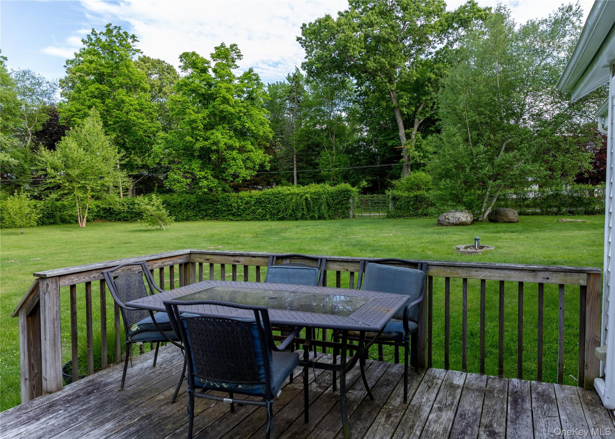 23 Lucille Road Carmel, NY 10512 - Photo 36 of 44 a view of a deck with furniture and a backyard