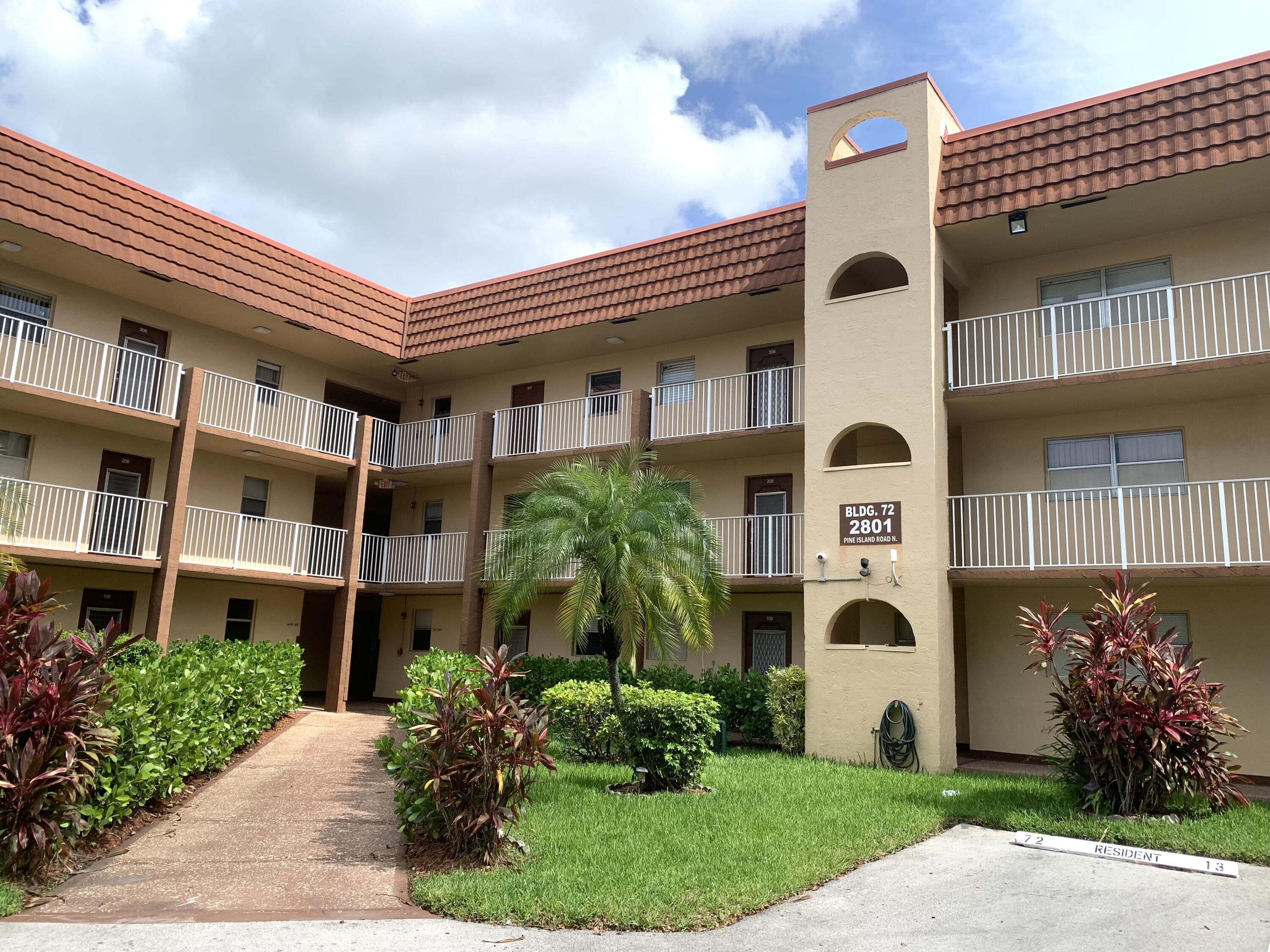 2801 North Pine Island Road, Unit 110 Sunrise, FL 33322 - Photo 23 of 26 IMG_2865 building