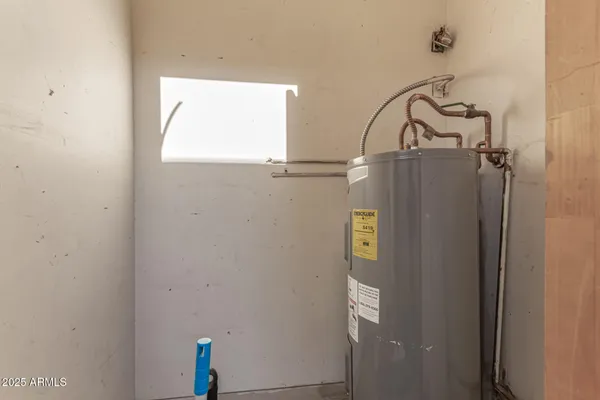 a bathroom with a window and vanity