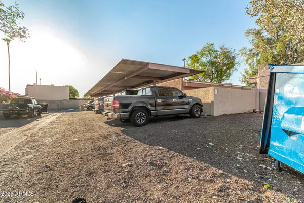 a view of a car parked in front of a house