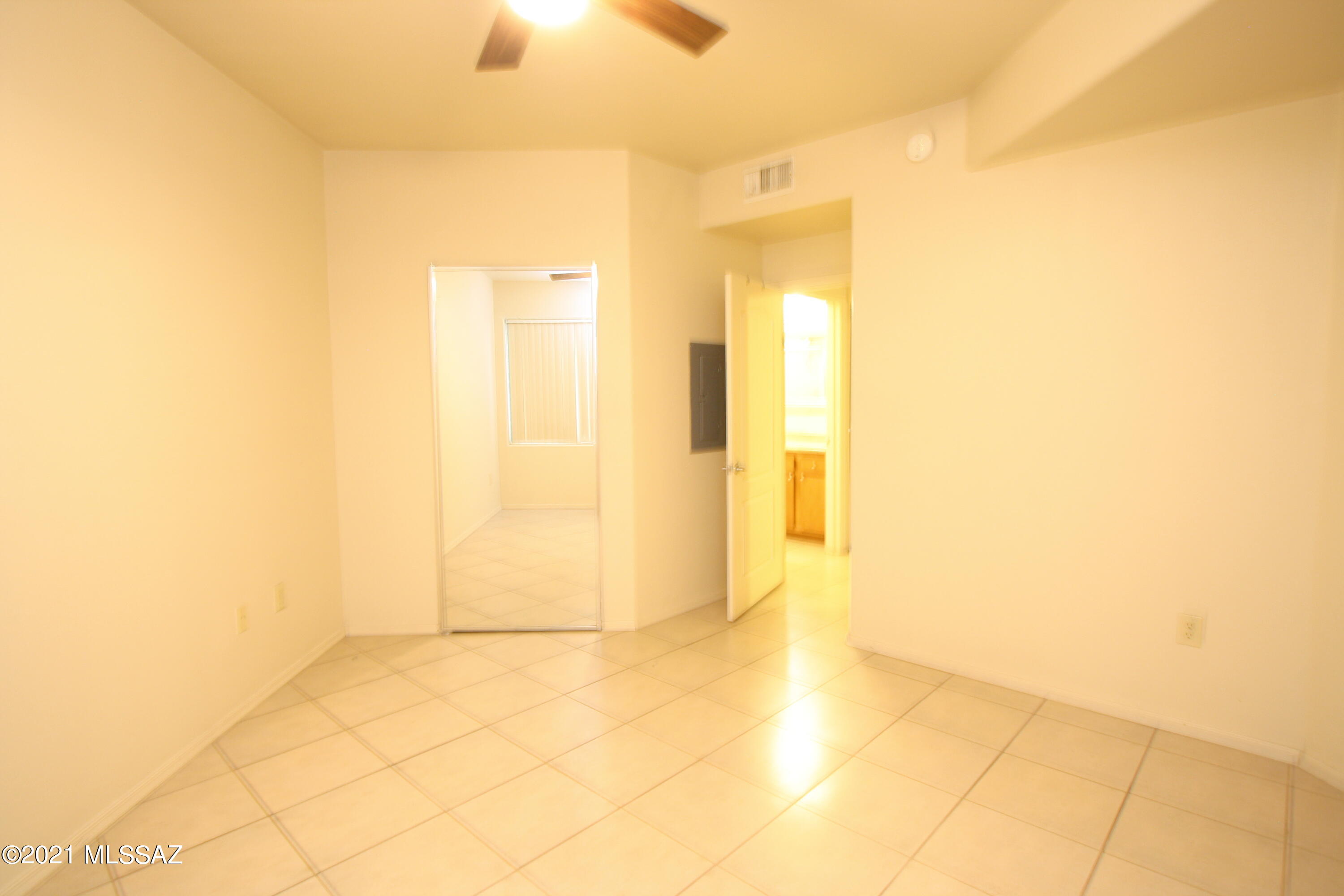 2550 East River Road, Unit 5104 Tucson, AZ 85718 - Photo 13 of 14 a view of a bathroom with a shower