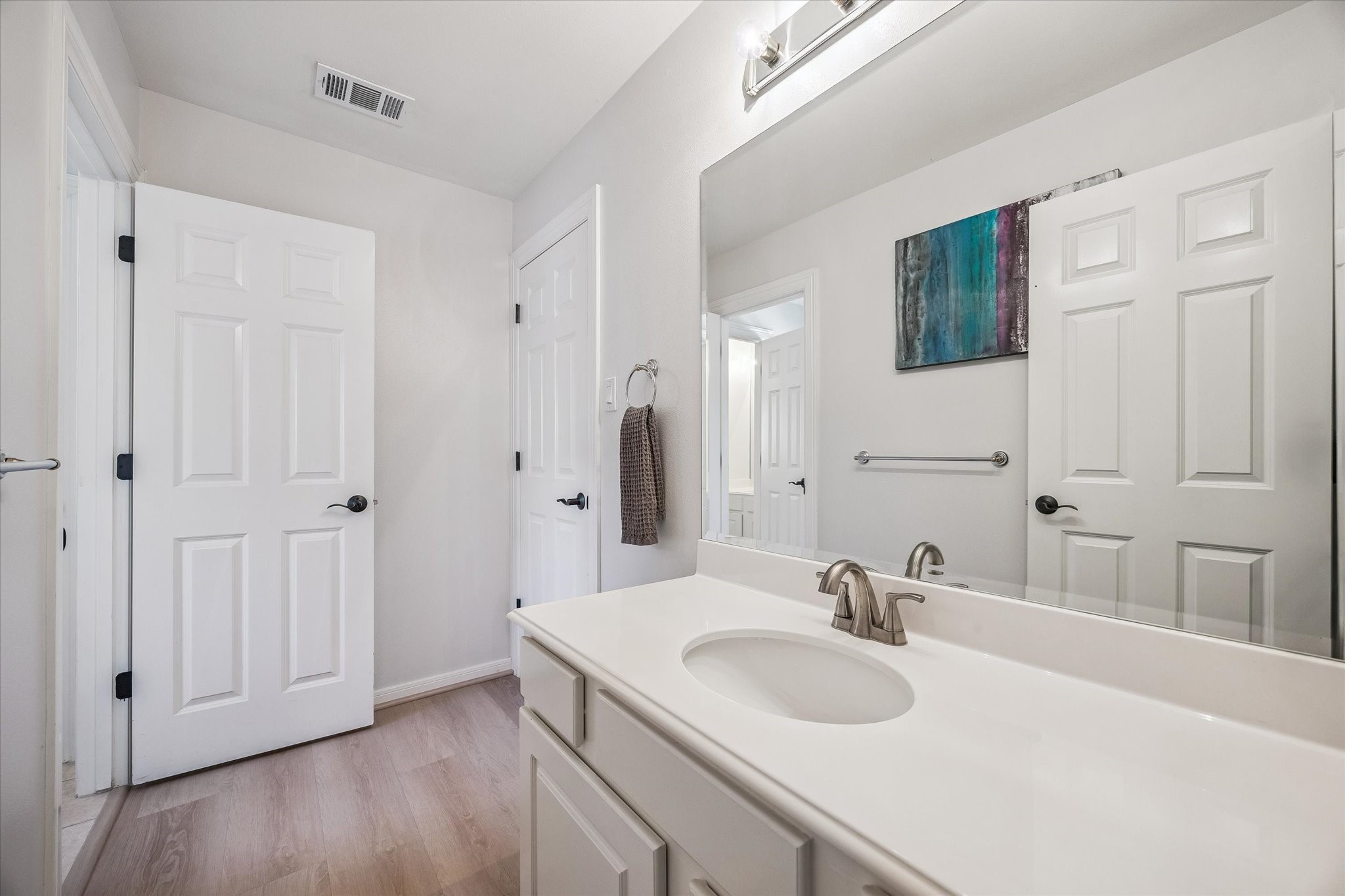 3047 Bonnebridge Way Boulevard Houston, TX 77082 - Photo 45 of 50 This secondary bathroom serves both additional bedrooms and provides convenient access to the game room. It features a spacious vanity with ample countertop space and updated, modern lighting.
