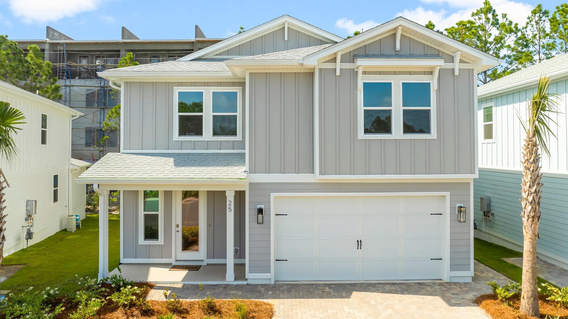 25 Ashwood Drive Santa Rosa Beach, FL 32459 - Photo 2 of 54 a front view of a house with a yard