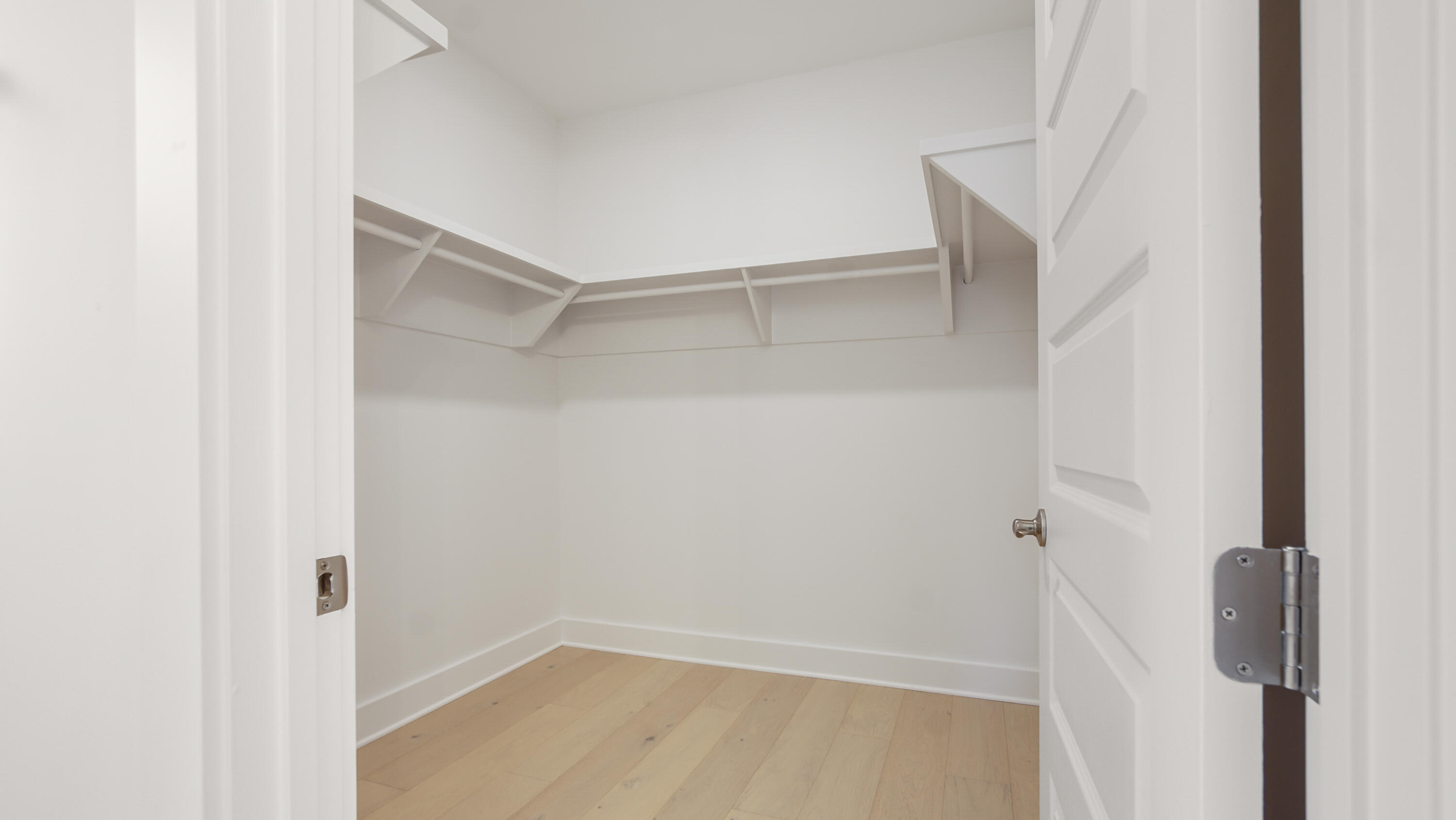 25 Ashwood Drive Santa Rosa Beach, FL 32459 - Photo 40 of 54 a view of walk in closet with empty racks
