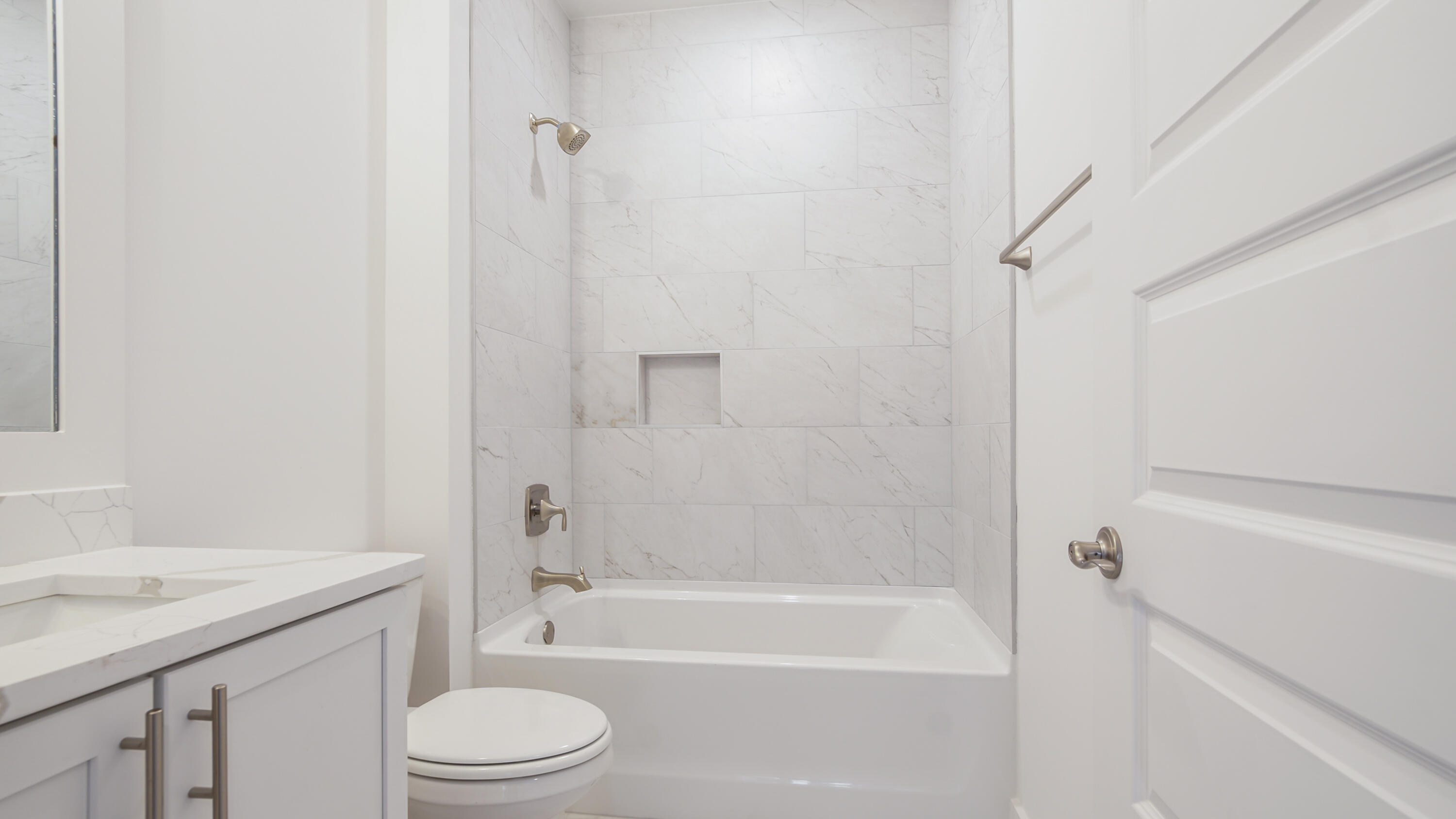 25 Ashwood Drive Santa Rosa Beach, FL 32459 - Photo 51 of 54 a bathroom with a granite countertop toilet a sink and bathtub