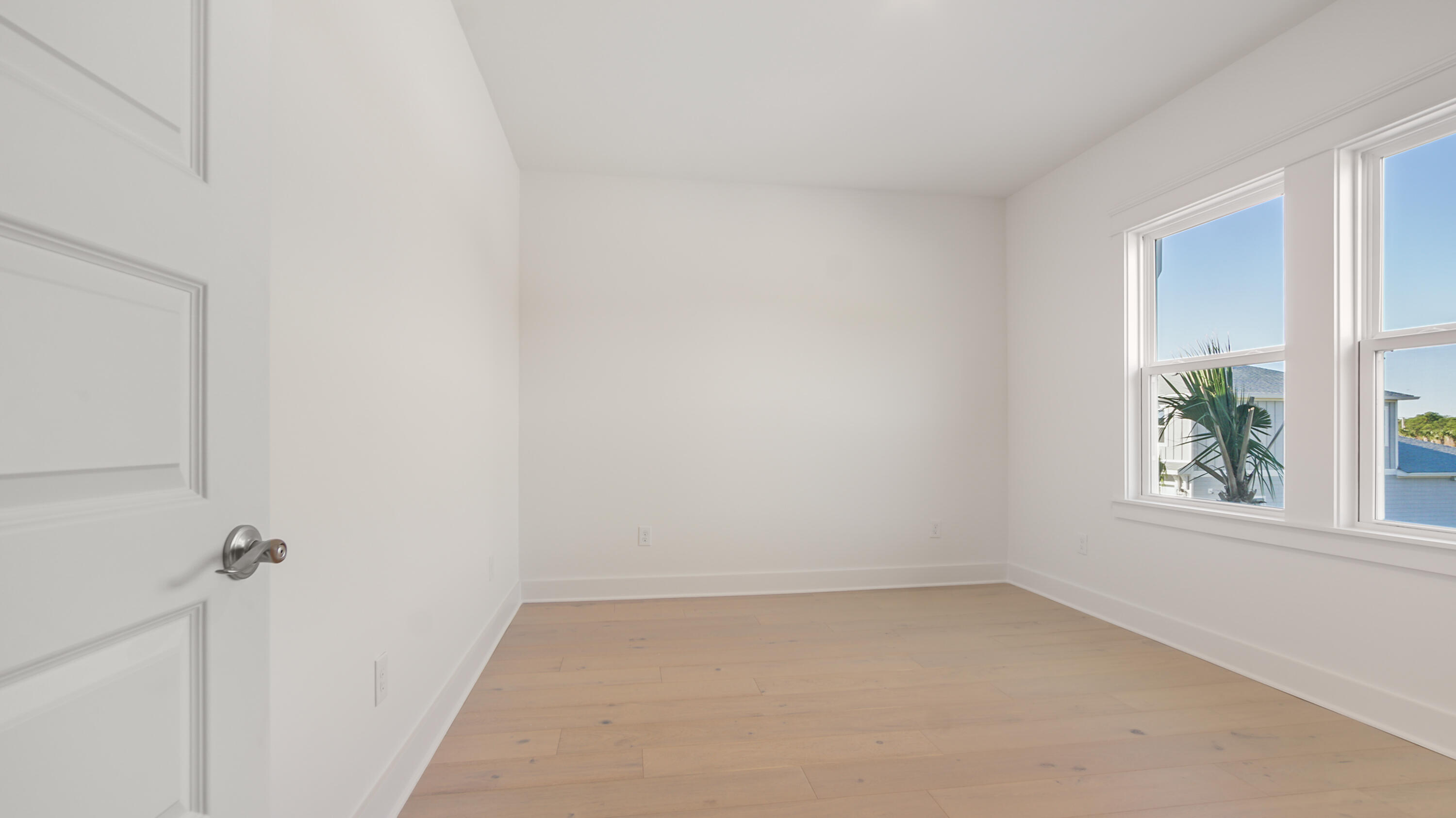 25 Ashwood Drive Santa Rosa Beach, FL 32459 - Photo 53 of 54 wooden floor in an empty room with a window