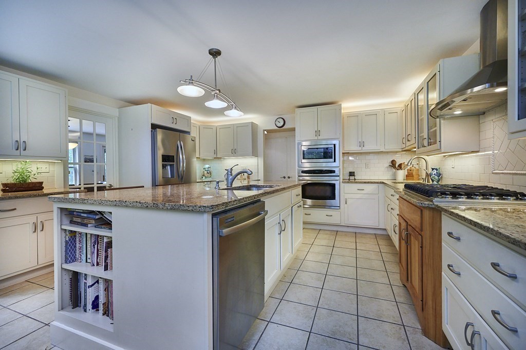 3 High Meadow Road Northampton, MA 01062 - Photo 8 of 40 a kitchen with stainless steel appliances granite countertop a sink and cabinets