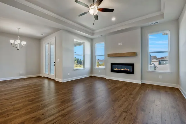 a view of a bathroom with a black and white wall