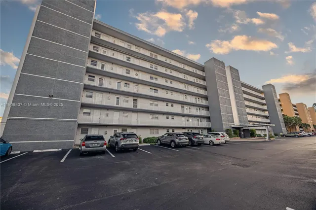 a view of a street with cars