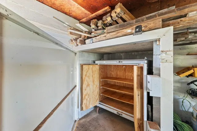 a house view with swimming pool in front of it