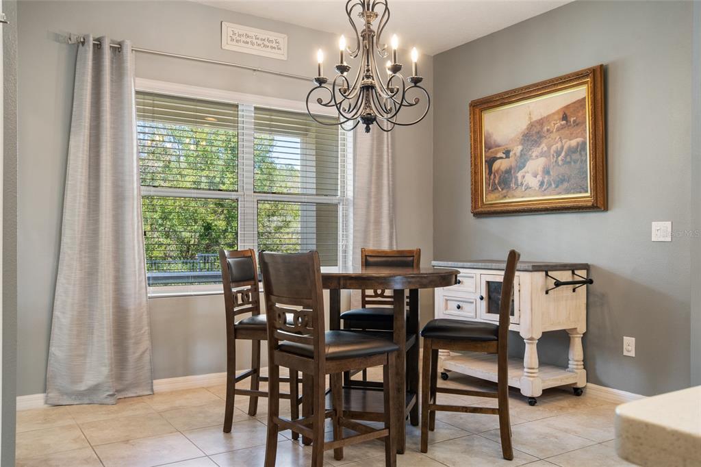 615 Timbervale Trail Clermont, FL 34715 - Photo 30 of 100 a view of a dining room with furniture window and outside view